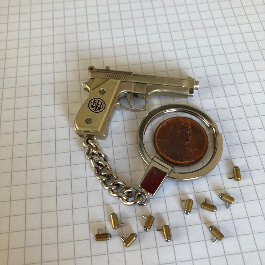 Продам (Брелок)  Миниaтюрный Пистолет Беретта Beretta под 2мм патрон
